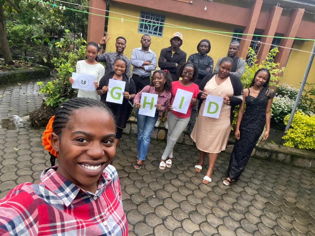 GHID members smiling with the GHID letters