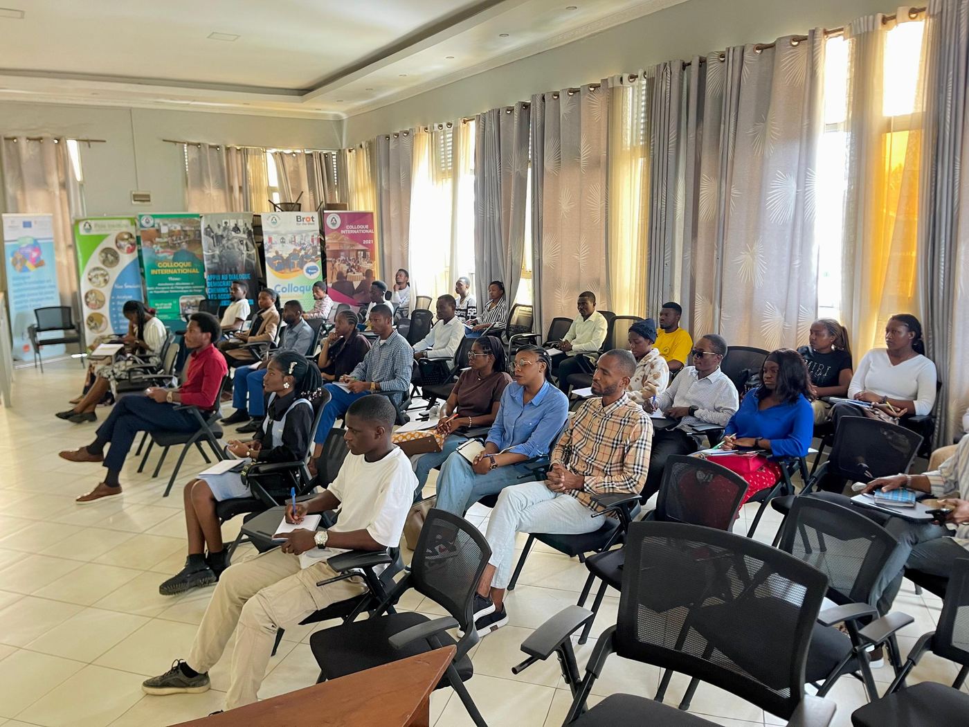 Participants listening during a conference